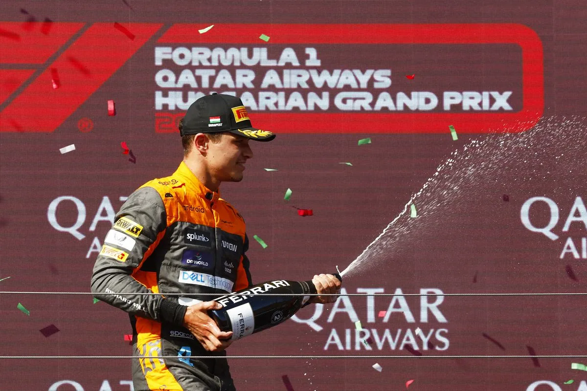 Lando Norris reacts to signing a new deal with McLaren